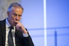 Former British Prime Minister Blair listens to a question during an appearance at the 9/11 Memorial Museum in New York