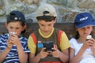 Children Playing With Electronic Games