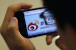 A man visits Sina's Weibo microblogging site in Shanghai