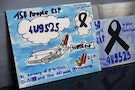 Drawings in commemoration of the 150 victims of Germanwings flight 4U9525, which crashed last week in the French Alps, are pictured in Duesseldorf's airport