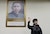 洪秀柱＿Hung Hsiu-chu, newly elected chairperson of Taiwan's Nationalist Party or Kuomintang, waves in front of a portrait of the founding father of the Republic of China, Sun Yat-sen, after a news confer