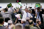 Members of the impeachment committee celebrate after voting on the impeachment of Brazilian President Dilma Rousseff at the National Congress in Brasilia