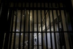 監獄＿死刑＿A guard stands behind bars at the Adjustment Center during a media tour of California's Death Row at San Quentin State Prison in San Quentin, California