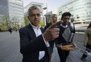 Britain's newly elected mayor Sadiq Khan arrives for his first day at work at City Hall in London