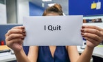 close up woman hold a piece of paper of I quit the job