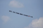 A message towed by an airplane urges people to donate blood, after a mass shooting at a gay nightclub in Orlando