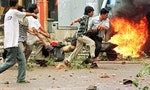 1998年印尼排華暴動後：有人為洩恨傳假照片給報社，也有逃難商人成為特派記者