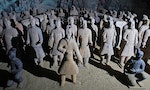 The Spirit of Taking: Chinese Tomb Raiders Learn from Online Archaeologists