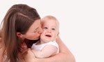 mother-kissing-baby-87129433012057t