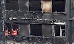 時隔兩個月英國格蘭菲爾大樓火災倖存者與貓咪重聚