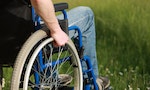 Close up of a man in a wheelchair in the park