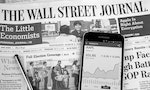 MONTREAL, CANADA - MARCH 3, 2016 - The Wall Street Journal Newspaper with Samsung S5 on it. The Wall Street Journal Is an American international daily newspaper.