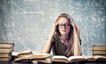 A beautiful blonde girl is stressed by the study.