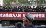 ASIA NEWS BITES: Former US Official Accused of Spying for China; 'Perfect Police State' Emerges in Xinjiang; 4 Dead in Shooting near Taipei