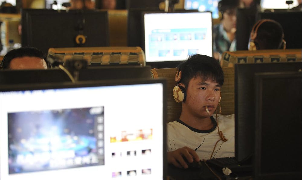 iPhone Workers Become Legendary Warriors in China's Internet Cafes