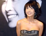 Portrait photograph of the South Korean actress, Choi Jin-sil (최진실, 1968-12-24 – 2008-10-02)). It was taken by a photographer of Segye Ilbo (Segye Newspaper)