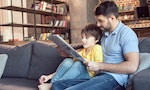 Depositphotos_Father_and_son_reading_new