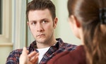 Depressed Young Man Talking To Counsellor