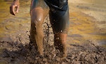 Mud race runners extreme sport. — Photo by Pavel1964