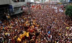 【圖輯】菲國天主教「黑耶穌」遊行百萬名信徒上街     1死逾800傷 