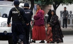 In Xinjiang and Tibet, Police Surveillance 'Exceeds East Germany'