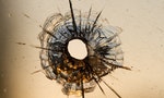 bullet hole in window - background 
