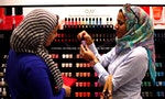 Two_Egyptian_women_buy_"breathable"_nail