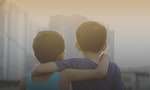 Two asian young brothers hugging each others over the sunset. Brotherhood friendship concept. Vintage editing - Image