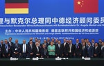 德國總理梅克爾帶著德國企業訪中國