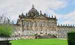 Castle Howard, Yorkshire, England - Aug 2016: View of the exterior of Castle Howard of Brideshead film fame, with beautiful lawns and gardens on a sunny summer day in the North Yorkshire countryside.