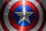 AVENGERS STATION, LONDON - FEBRUARY 2019: Captain America (played by actor Chris Evans) Shield on display at Avengers S.T.A.T.I.O.N. in the lead up to the movie Avengers Endgame.