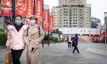 CHINA,CHENGDU,Chunxi Rd.-JANUARY 23,2020: Coronavirus epidemic in China .People wearing face masks. Novel coronavirus (2019-nCoV), people in white medical face mask
