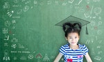 Smart educated school kid student with graduation hat doodle on chalkboard for children's education success and scholarship concept