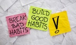 break bad habits, build good habits - motivational reminder on colorful sticky notes - self-development concept