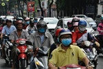 People_with_face_masks_stuck_in_traffic_